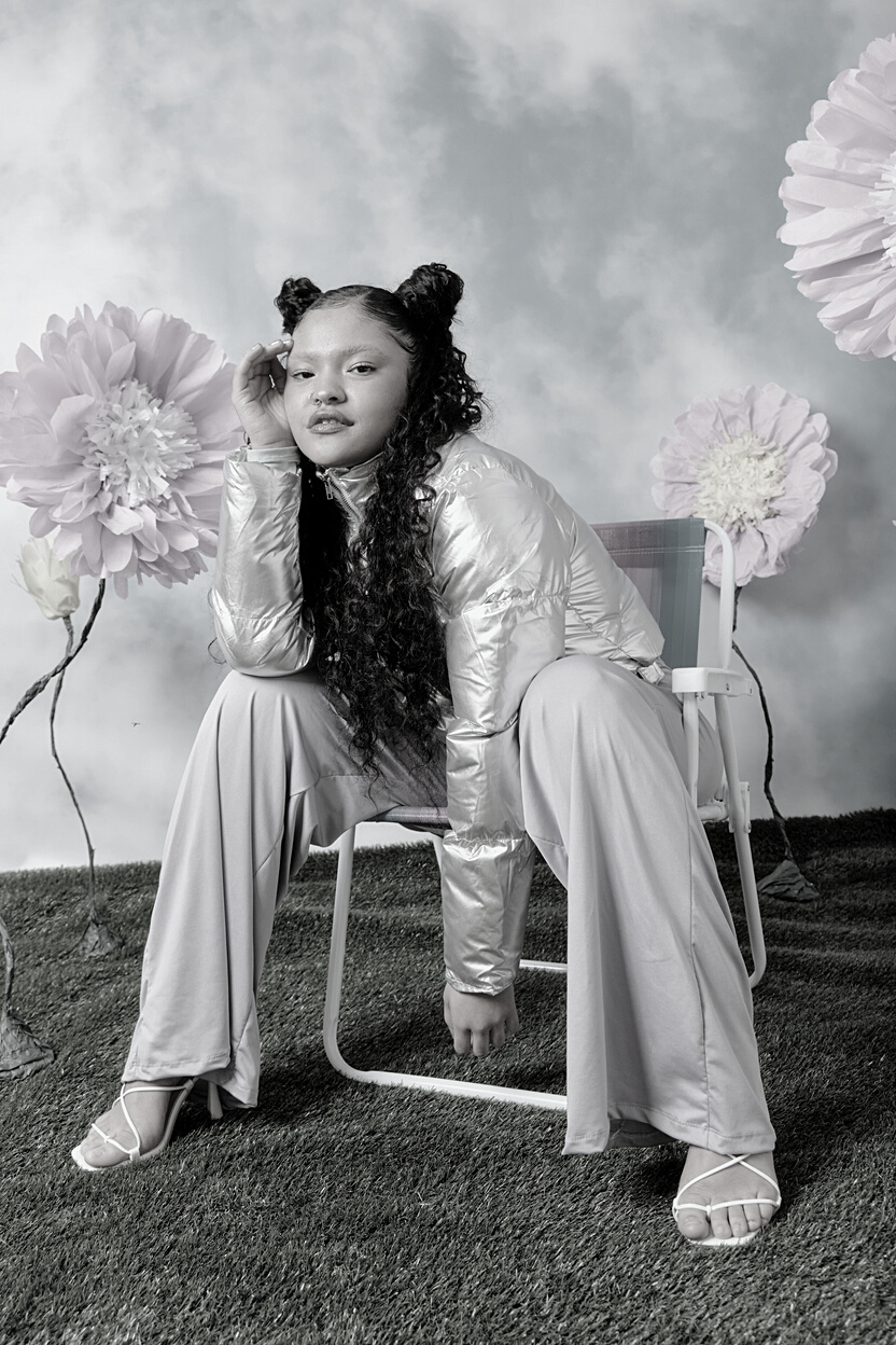 Stylish Woman Sitting on a Chair